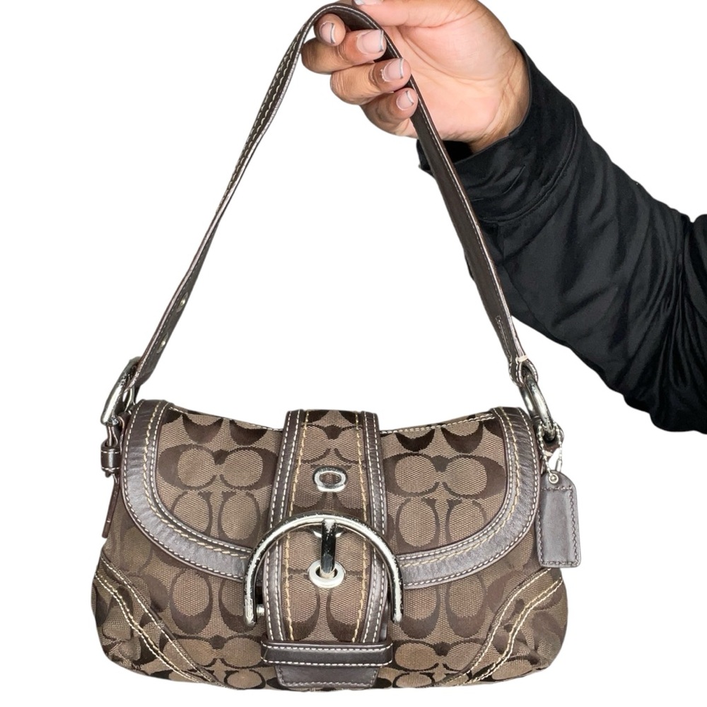 Coach dark brown Soho flap bag.